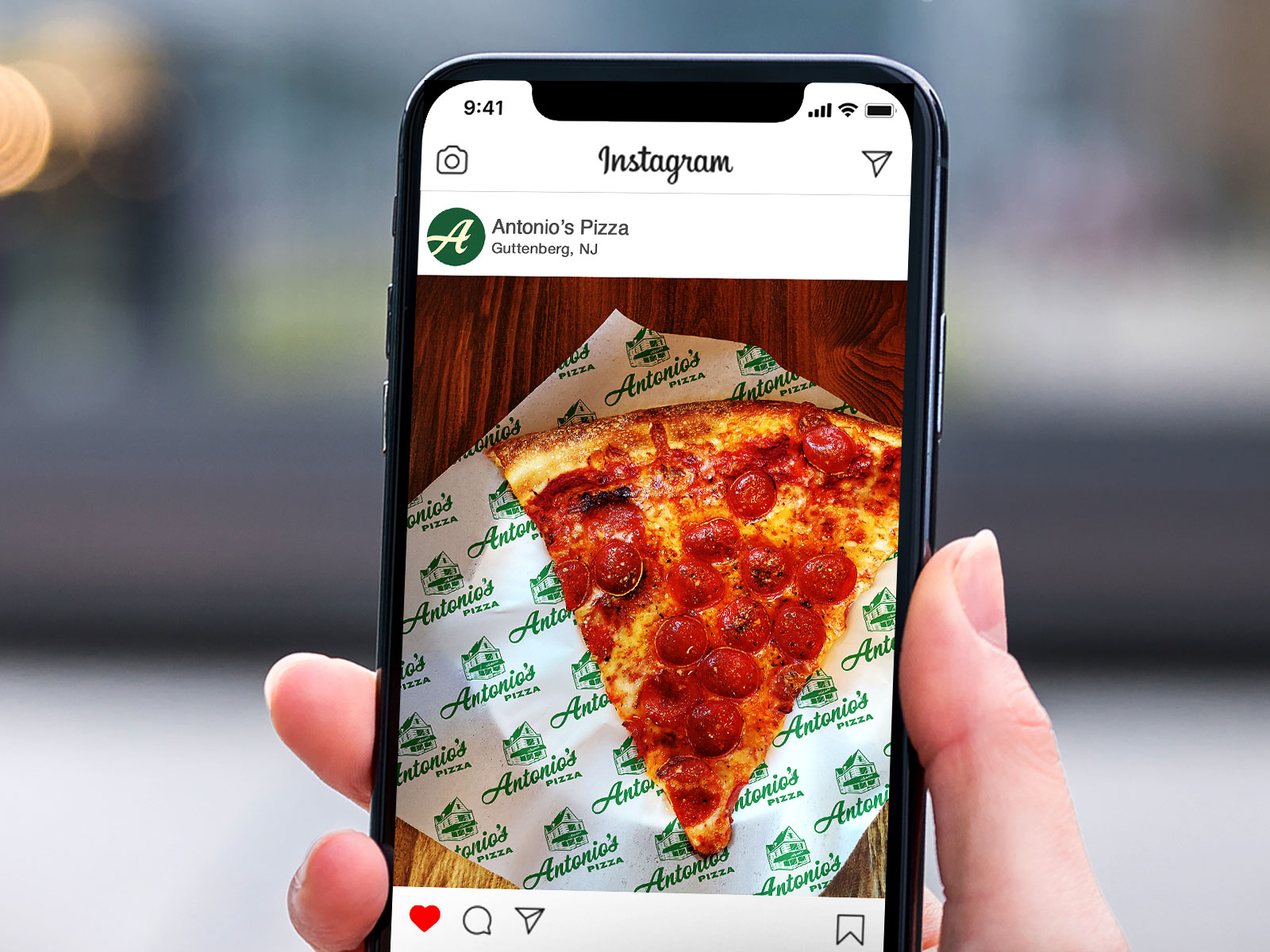 Antonio's Pizza identity. Instagram profile and branded liner paper.